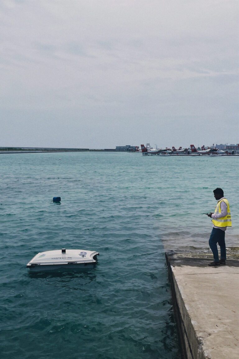 WasteSharks swimming in the archipelagic paradise of the Maldives next to the airport, collecting floating trash