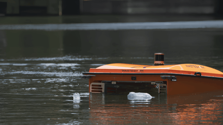 RanMarine WasteShark capturing 2 floating plastic bottles