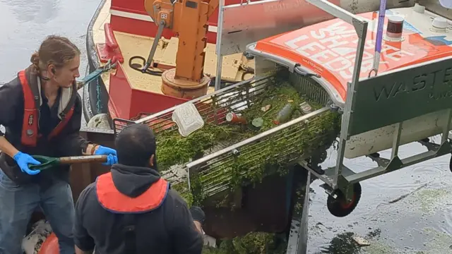 Workers in Leeds emptying their WasteShark.