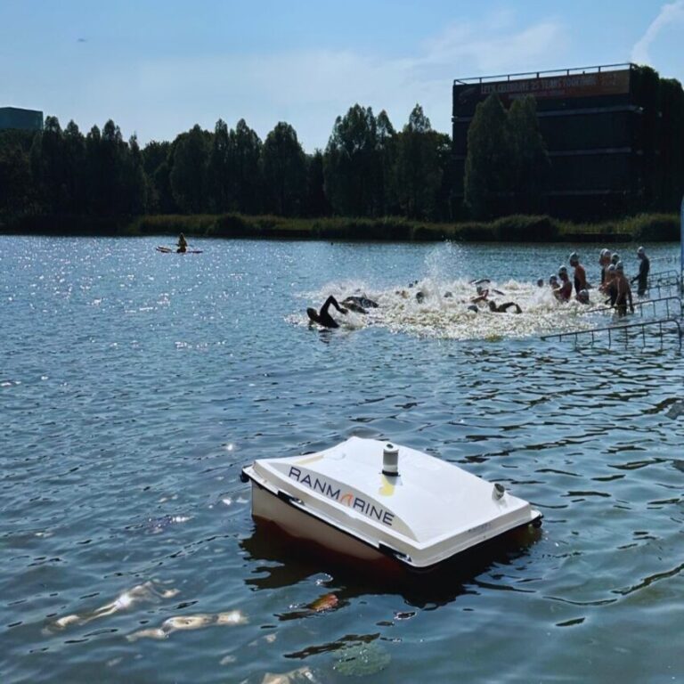 Swimmers at triathlon with a RanMarine CyanoShark