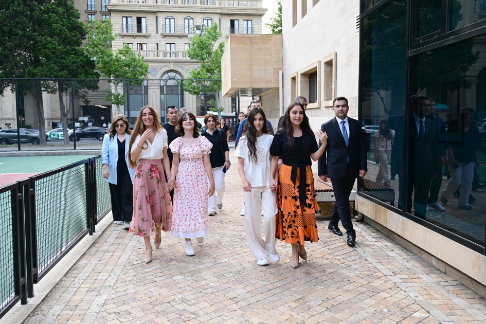 WasteShark Deployed at Baku's Seaside National Park to Clean Baku Bay 1 Arzu Aliyeva (2nd from left) and Leyla Aliyeva (orange skirt 2nd from right) and dignitaries arrive for the launch